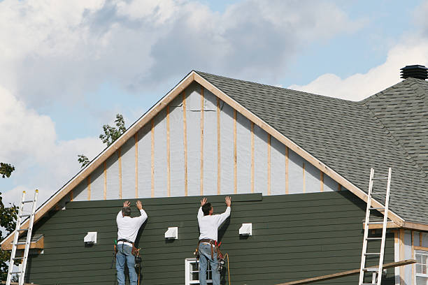 Professional Storm Damage Siding Repair technician working in York Springs, PA